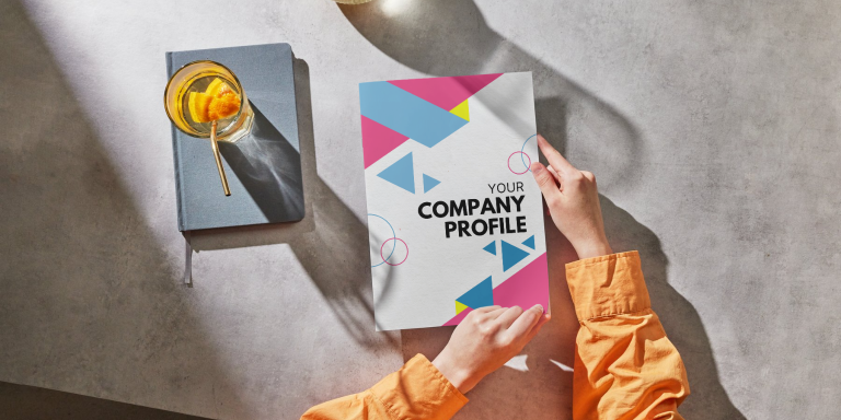 Corporate Printing services shown in a company profile printed by Total Print Management